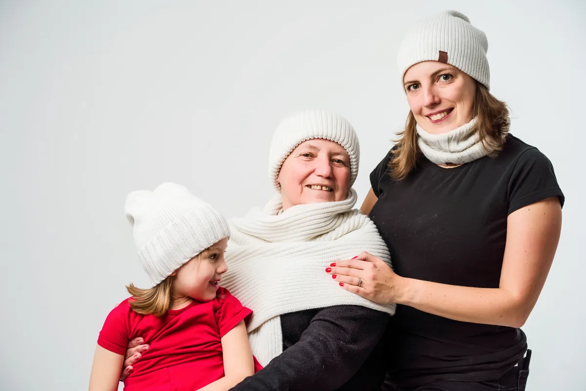 Three generations of the BerryBoat family in white knitwear from their own mill