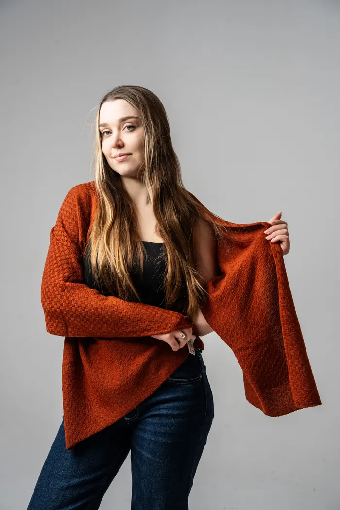 Rust cardigan in a structured stitch