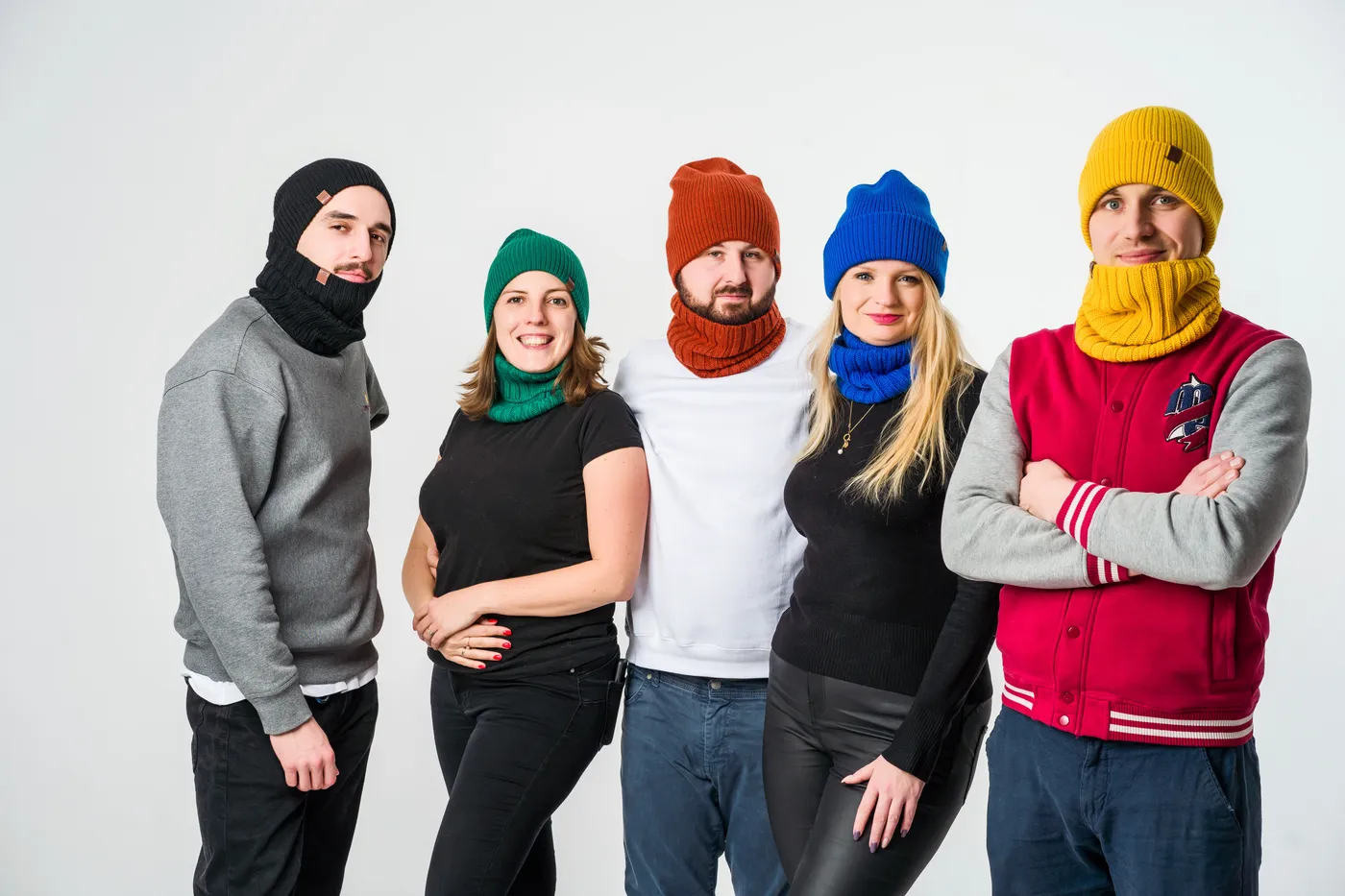 Five people in BerryBoat beanies and neck warmers in yarn-card colours
